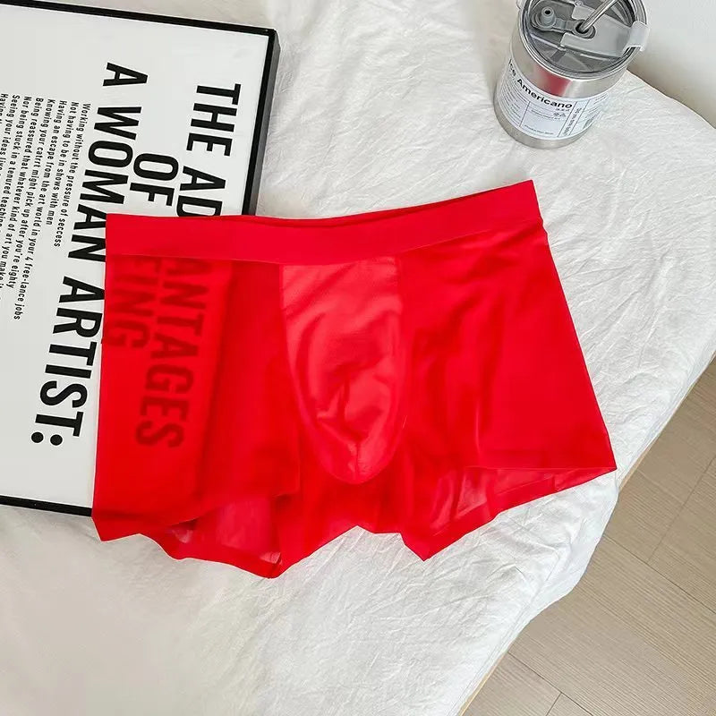 Ultra-thin antibacterial seamless men's boxers in honeycomb fabric on a colour swatch background.