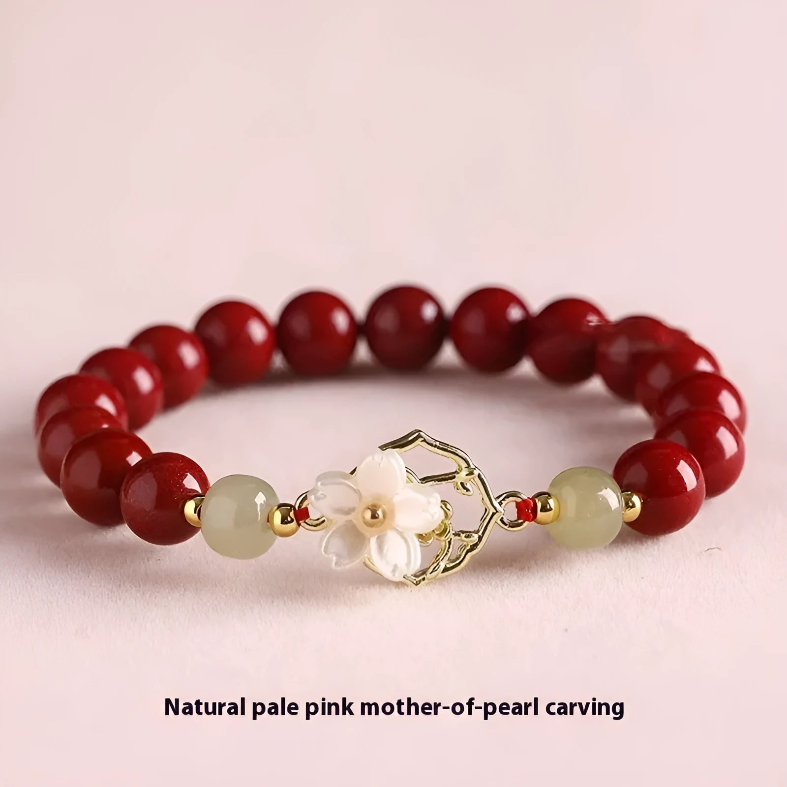 Cinnabar bracelet with Hetian Jade lotus charm and Bells of Ireland accents in New Chinese style
