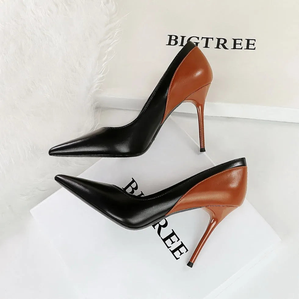 Retro style women's stiletto high heels in black or creamy-white with pointed toe and super high heel