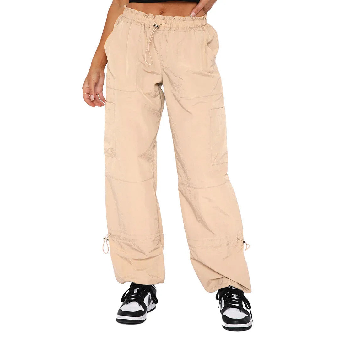 Multi-pocket straight-leg cargo casual pants in a light blue colour on a neutral background.