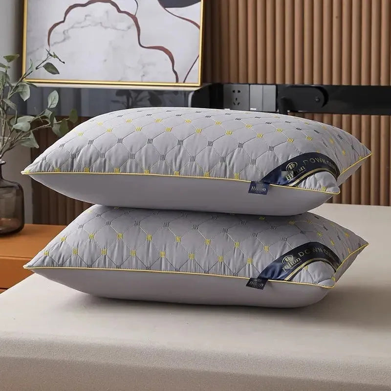 Polyester fibre fill bed pillow in light blue, showing standard 48x74cm size and loft.