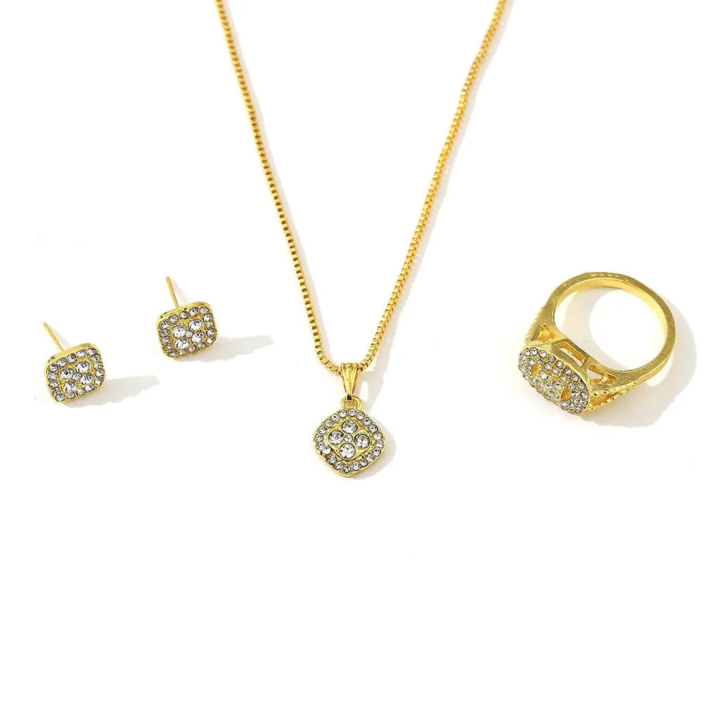 Three-piece alloy rhinestone wedding jewellery set with ring, stud earrings, and necklace in gold finish