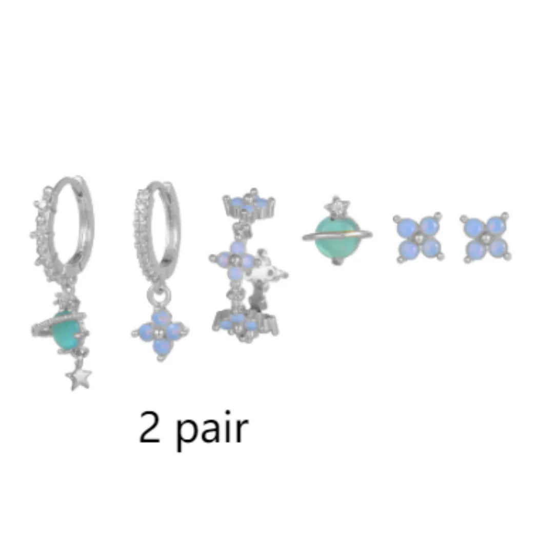 Blue protein colour flower nail design earrings with zircon accents in gold and silver options
