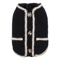 Cartoon-style quilted dog coat in light purple on a small dog.
