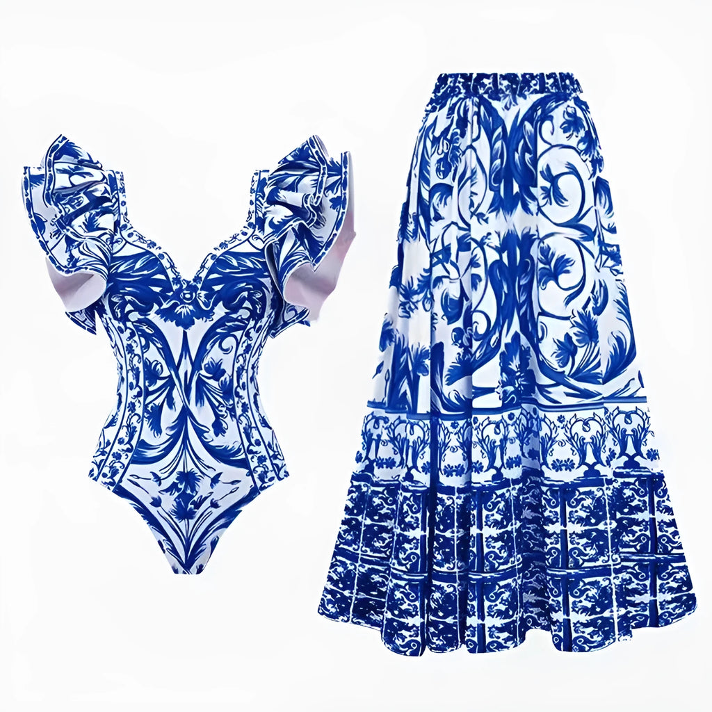 Women's printed one-piece polyester swimsuit with an attached matching skirt.