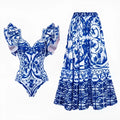 Women's printed one-piece polyester swimsuit with an attached matching skirt.