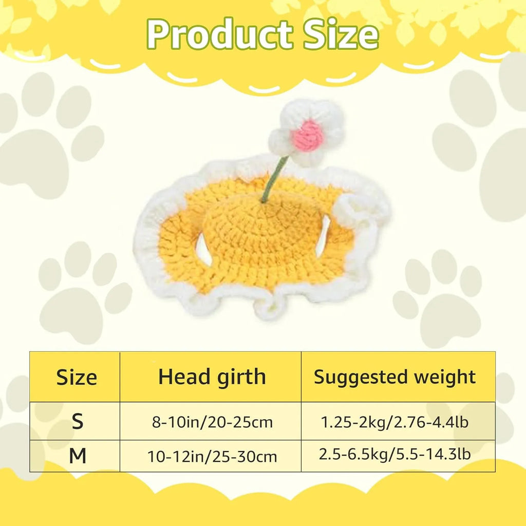 Green knitted cat hat with cartoon design on a small dog, showing soft fabric.