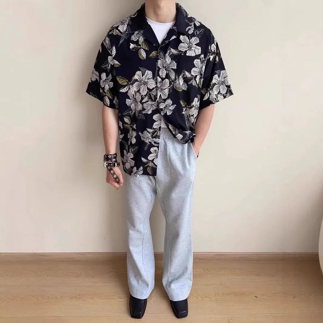 Black floral print men's shirt with a Cuban collar and short sleeves, made from ice silk fabric.