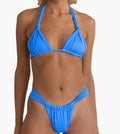 Women's pink bikini swimsuit with pleated detail and a knotted front on a mannequin.