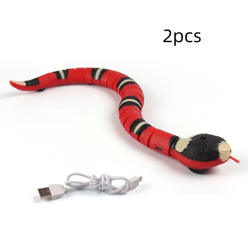 Smart sensing electronic snake cat toy with segmented plastic body and USB charging port