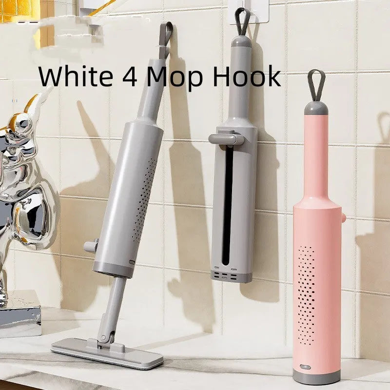 Rotatable self-squeeze mini flat mop with crevice brush and pink microfiber pad, shown extended to 19.3 inches.