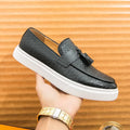 Men's black fringed casual leather look shoes with round toe and low heel