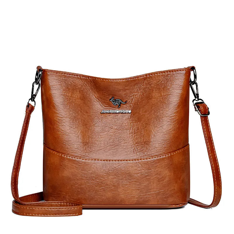 Women's soft leather large capacity shoulder bag in bucket design with internal organisation