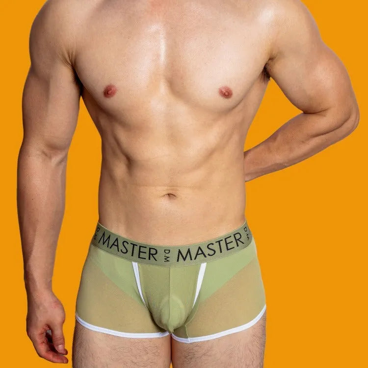 Men's solid colour low-waist ice silk shorts in army green, laid flat.