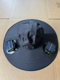 Men's grey solar cooling cap with large eave and visible fan unit on the front.