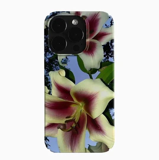 Dark Night Flower Trend Retro Art design on a hard shell iPhone case, showing glossy and frosted finish options.