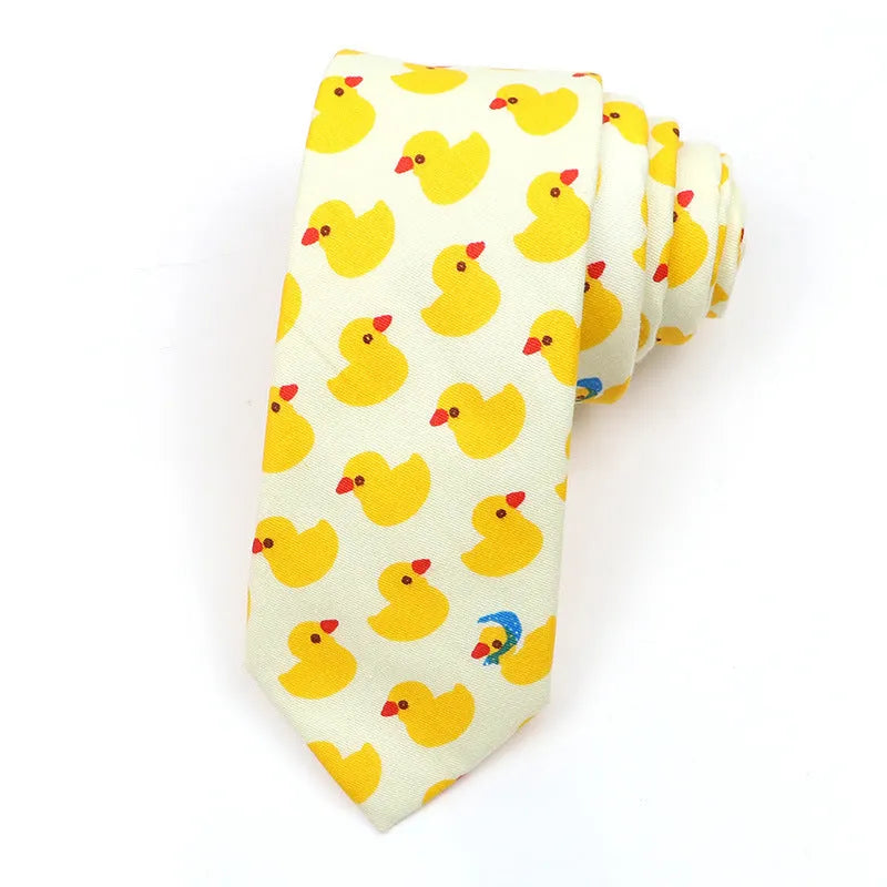 Narrow Korean style cotton bow tie with a printed cartoon pattern in various colours.