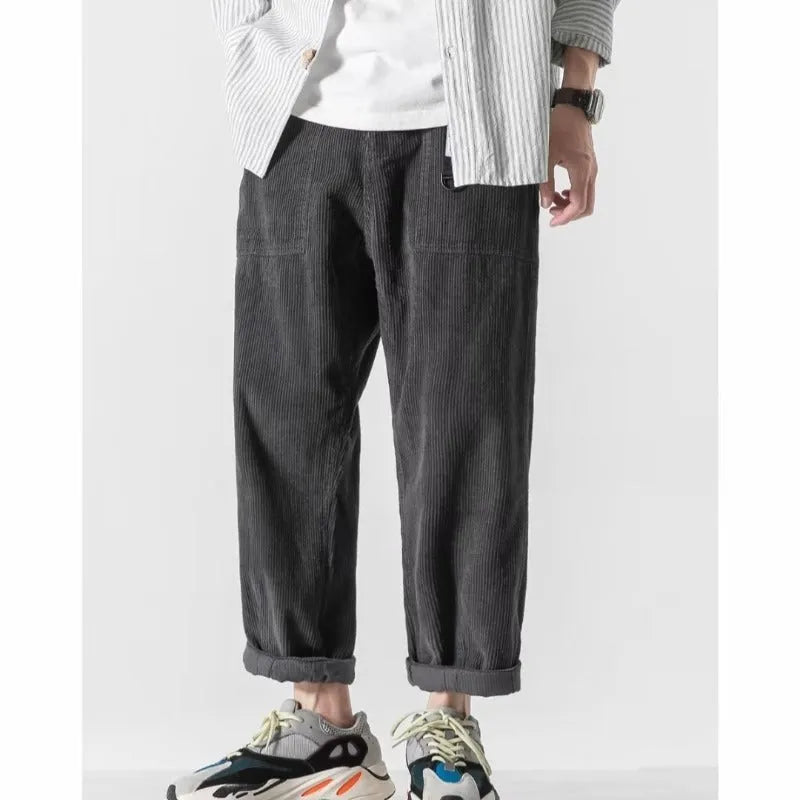 Loose straight tapered trousers in chemical fibre blend fabric, available in multiple sizes and colours