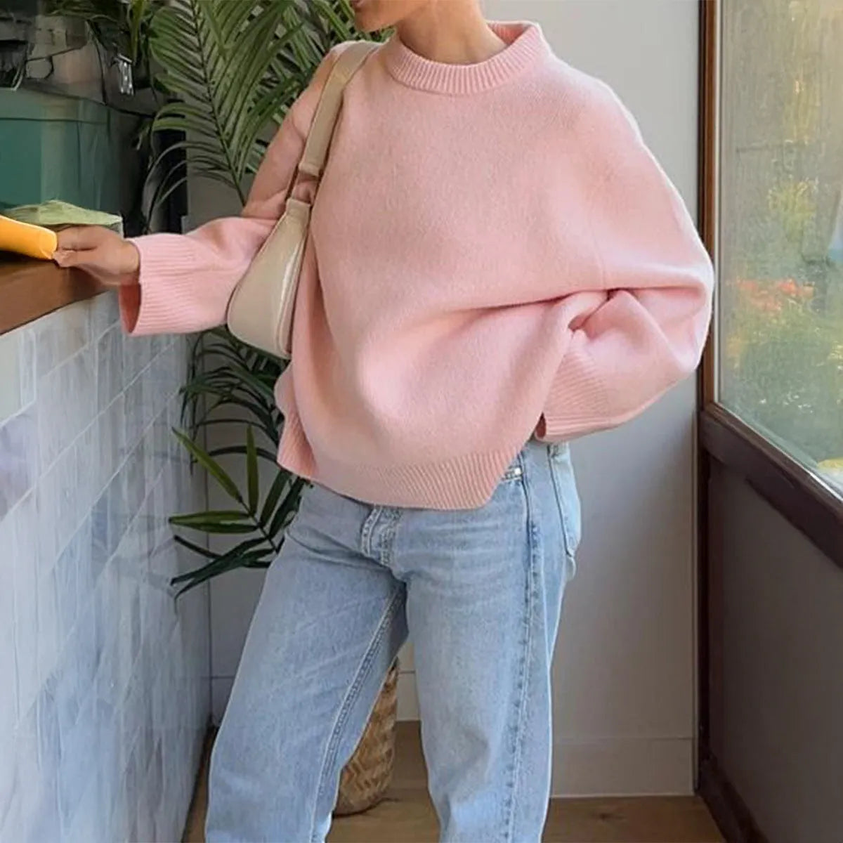 Casual solid colour long-sleeved polyester pullover sweater in light blue, front view