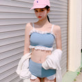 Women's solid colour nylon swimsuit with fashion suspenders and conservative split design