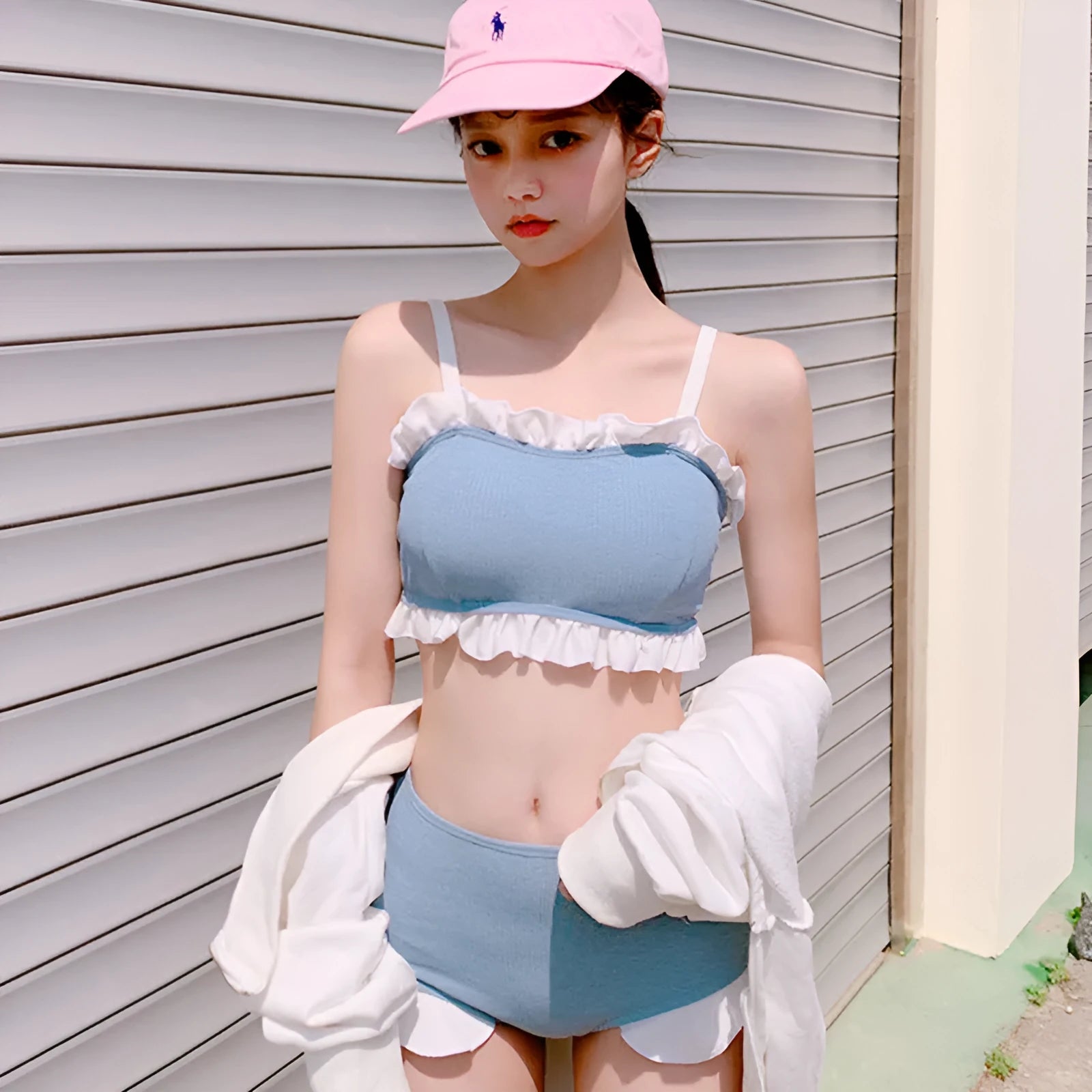 Women's solid colour nylon swimsuit with fashion suspenders and conservative split design