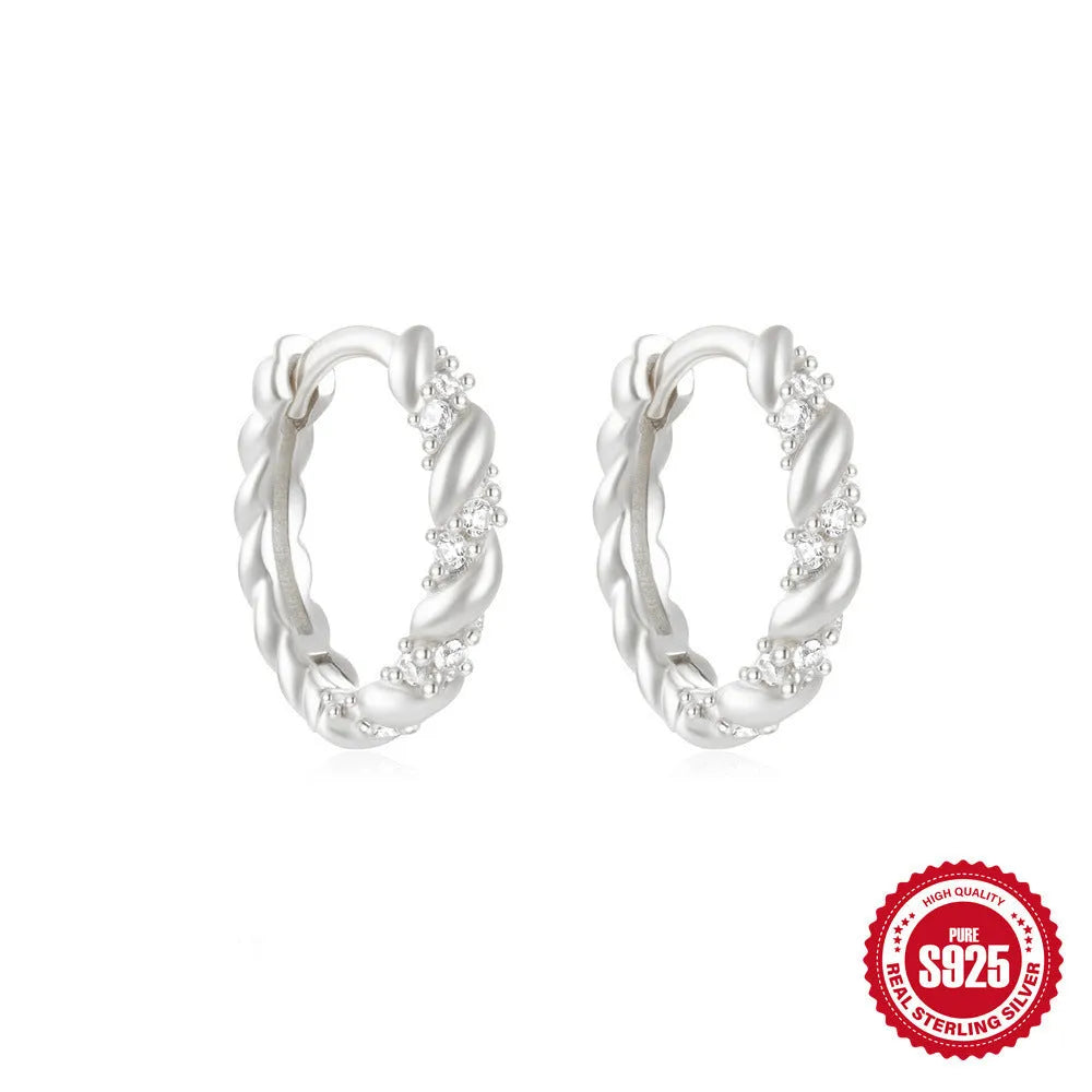 Small round geometric sterling silver stud earrings with diamond accents in gold or silver finish