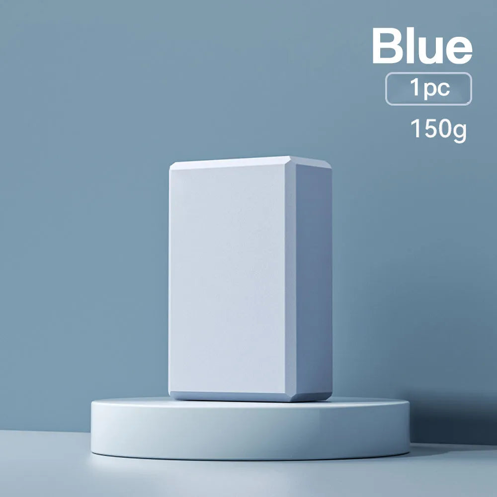 Solid colour EVA foam yoga block with grip ridges measuring 23x15x7.6cm