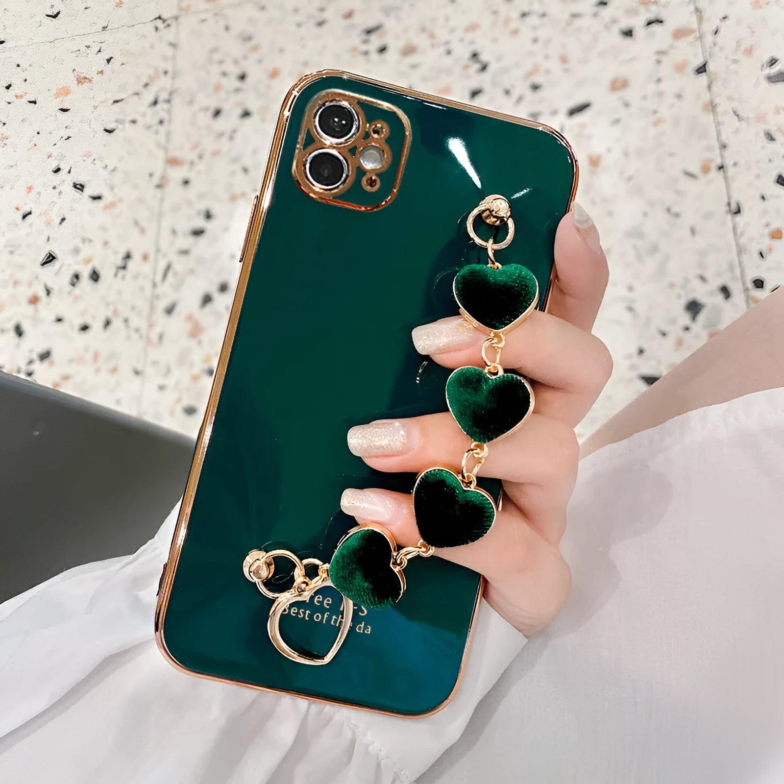 Silicone phone case with wrist bracelet for Samsung smartphones in solid green, pink, purple, or light green.