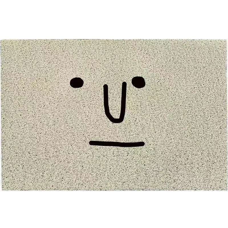 Square cartoon facial expression floor mat with geometric pattern in Mr. Big Nose colour