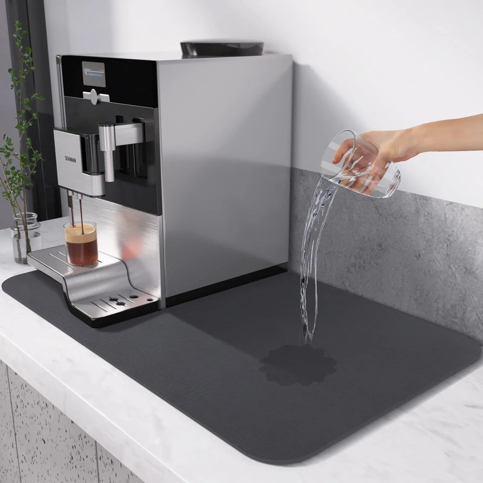 Black super absorbent square rubber drain pad mat on a kitchen countertop