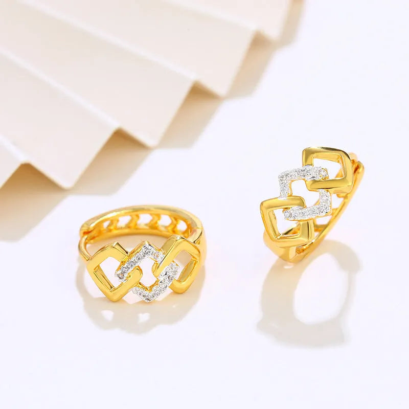 Geometric hollow-out gold electroplated earrings with colour separation design and ear clip fastening
