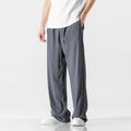 Men's straight-leg casual trousers in beige bamboo fibre fabric with a drawstring waist.