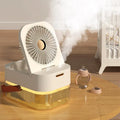 USB-powered desktop humidifier fan with large water tank and remote control on a wooden desk