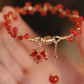 Red Chinese style magnetic therapy bracelet with maple leaf and ginkgo leaf alloy design