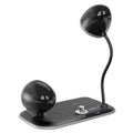 Three-in-one desk lamp with wireless charging pad and clock display in white or black colours