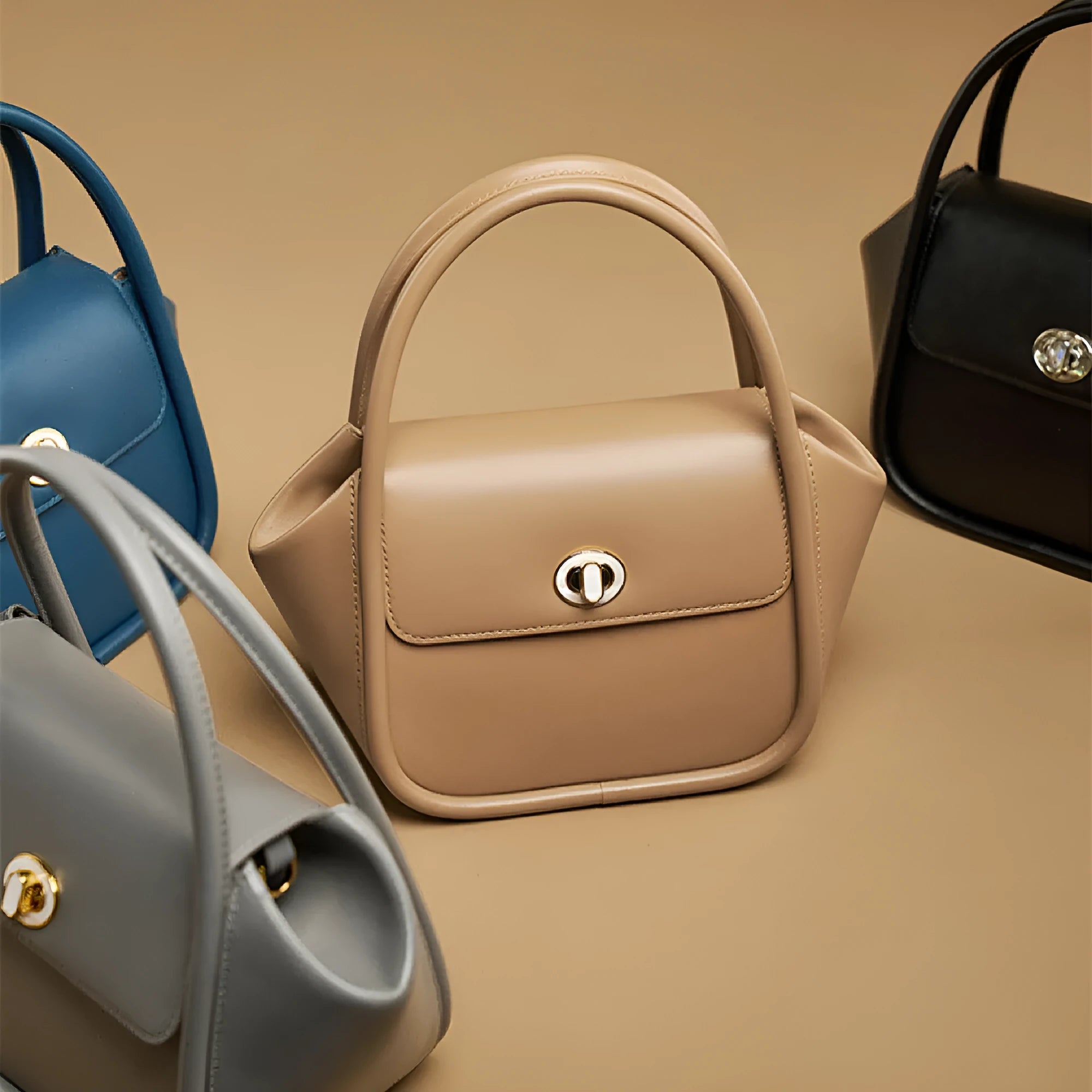 Wing shape cow leather cross-body handbag with buckle detail and fabric lining