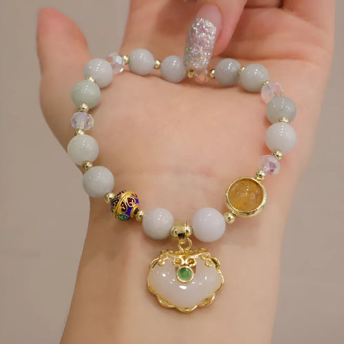 Women's geometric bracelet in choice of gray jade or strawberry quartz with ethnic metal decorations