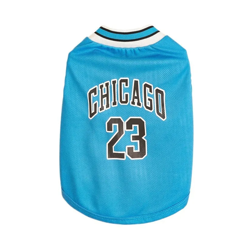 Dog wearing a black mesh polyester basketball vest with number 23 print, side view