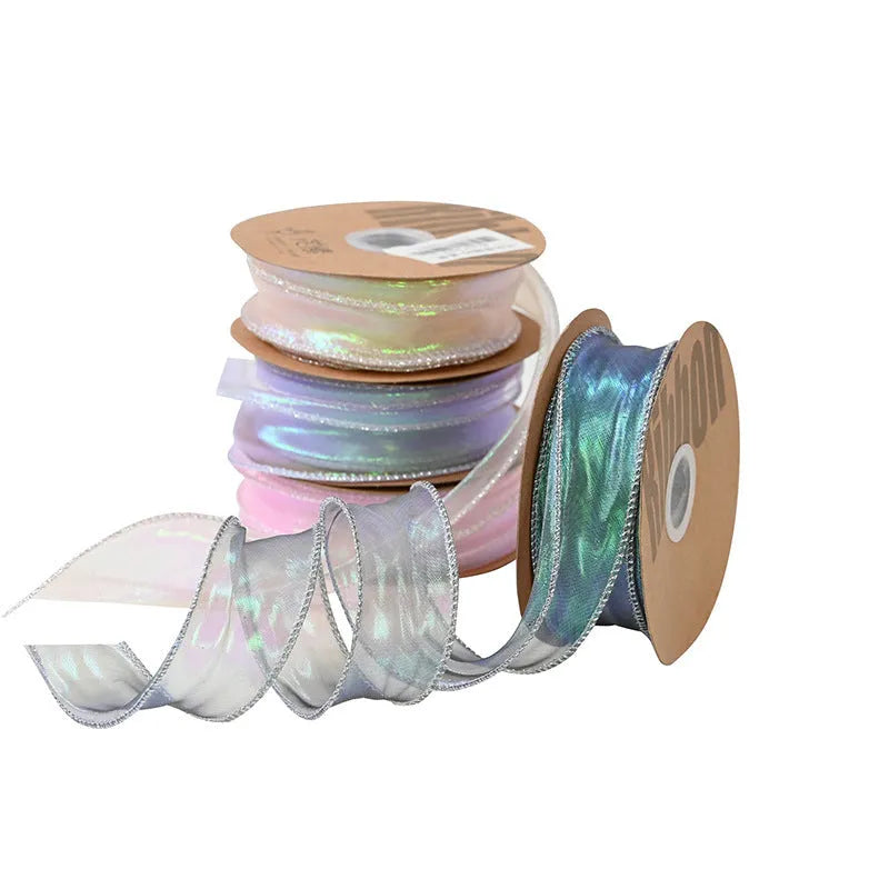 Roll of colourful fishtail yarn mesh decorative ribbon showing wave texture and multiple colour options