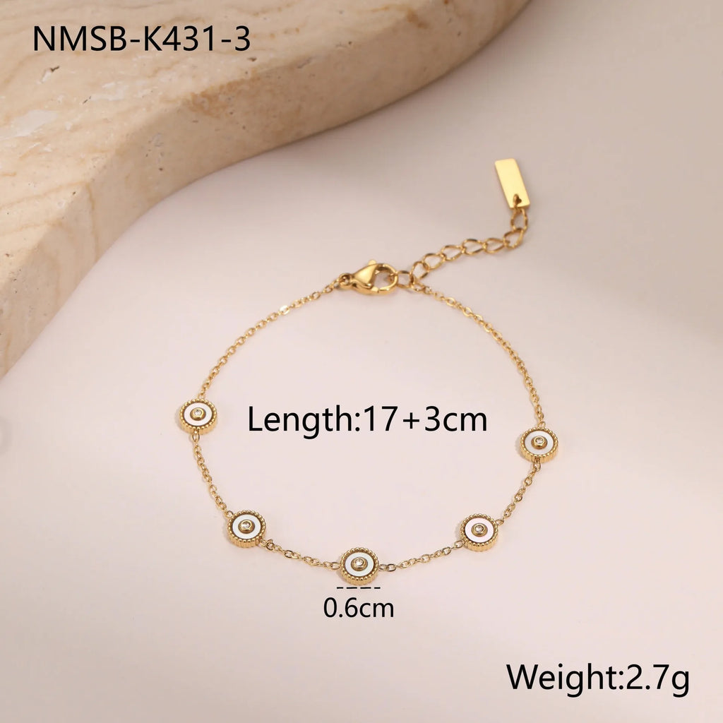 Women's stainless steel bracelet with 18K gold plating and geometric fritillary charm, includes matching necklace