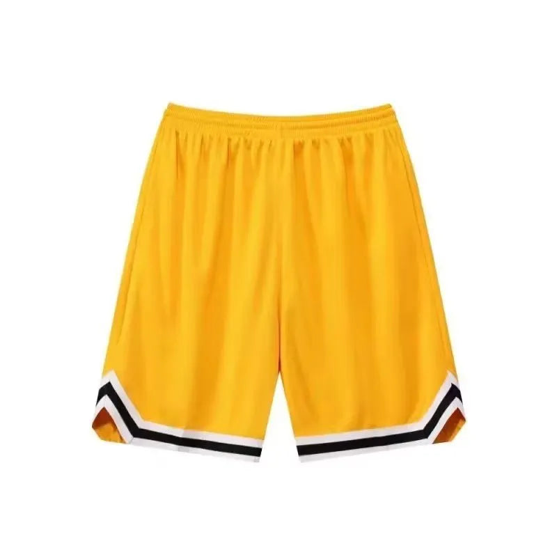 Man wearing loose-fit black polyester sports shorts for summer leisure activities.