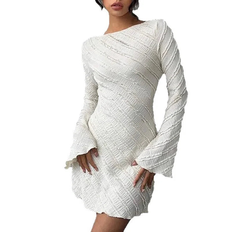 White knitted boat neck back tie dress with flared sleeves and pleated puff skirt