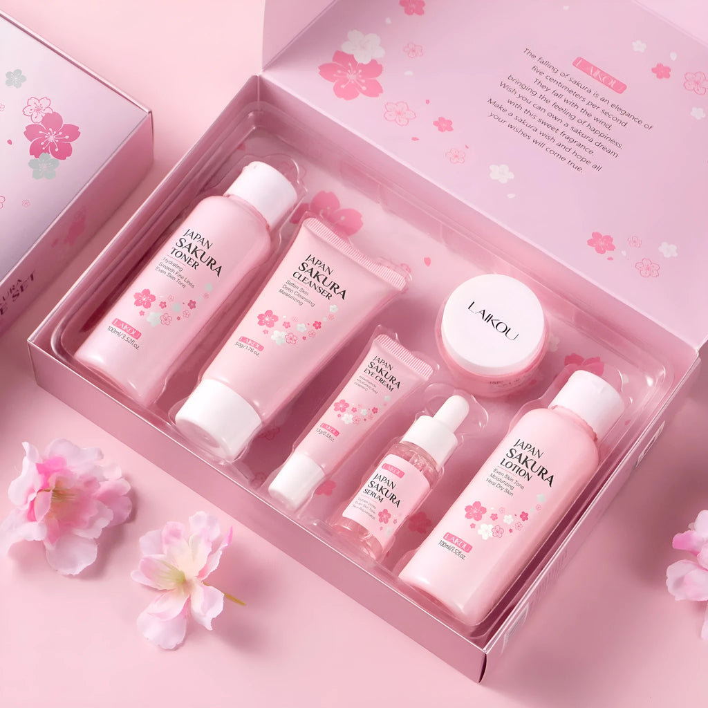 Cherry Blossom six-piece skincare set showing cleanser, toner, cream, essence, eye cream and essence cream