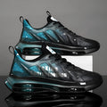 Men's black and green platform casual shoes with mesh upper and rubber sole.