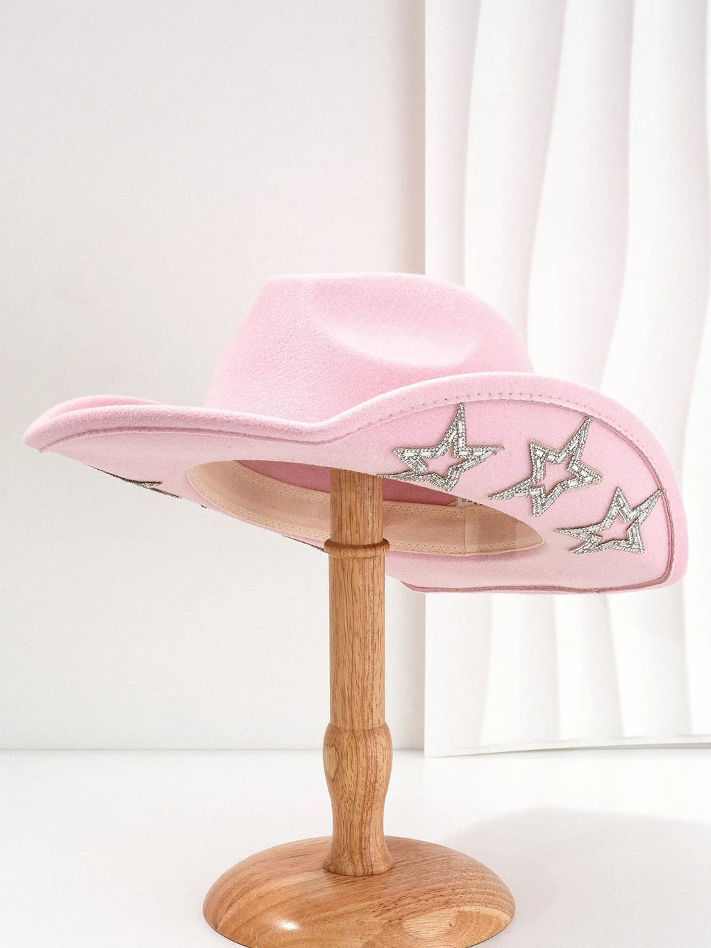 Beige polyester Western-style top hat with a conical crown and a silver hexagonal star decoration on the front.