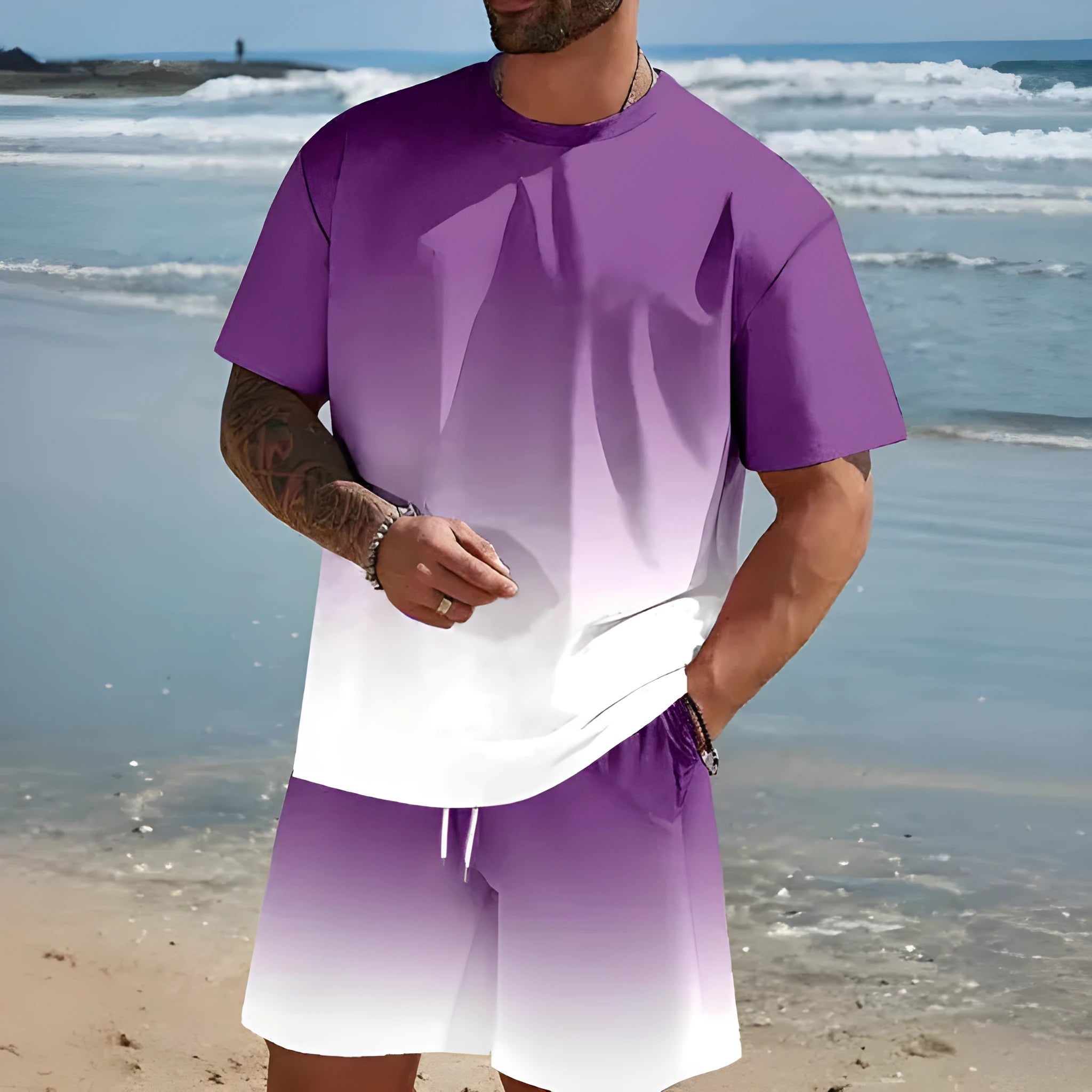 Man wearing a loose fit light blue short-sleeved t-shirt and matching shorts summer set.
