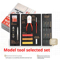 Meow Maker model tool set with metal implements and miniature handmade suit for crafting projects