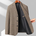 Man wearing a loose-fit solid colour wool-blend coat suitable for spring or autumn casual wear.