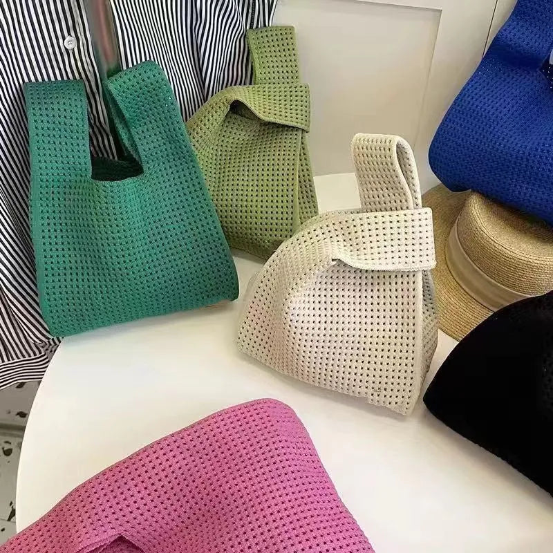 Soft polyester hollow knitted handbag for women with open-weave texture, shown in one of nine colour options