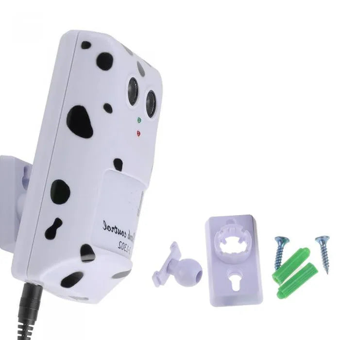 White anti-barking ultrasonic dog repeller mounted on a wall with rotary holder, 7x13x5cm